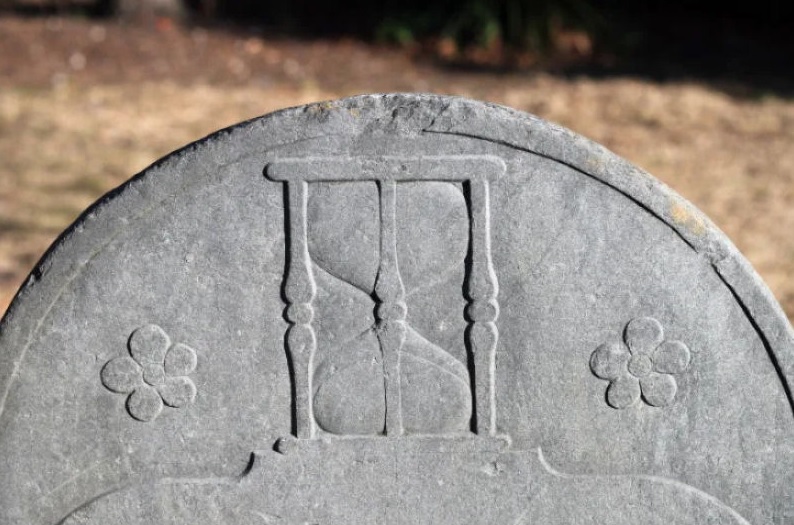 emblema funerário ampulheta