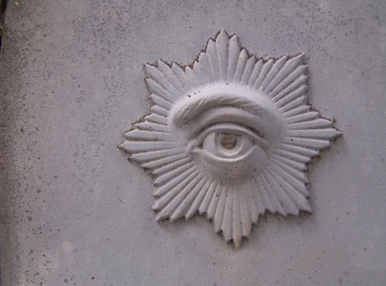 emblema funerário olho
