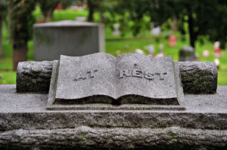 emblema funerário livro